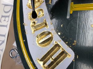 www.augustasigncompany.com-22980-applying gold leaf to carved signs