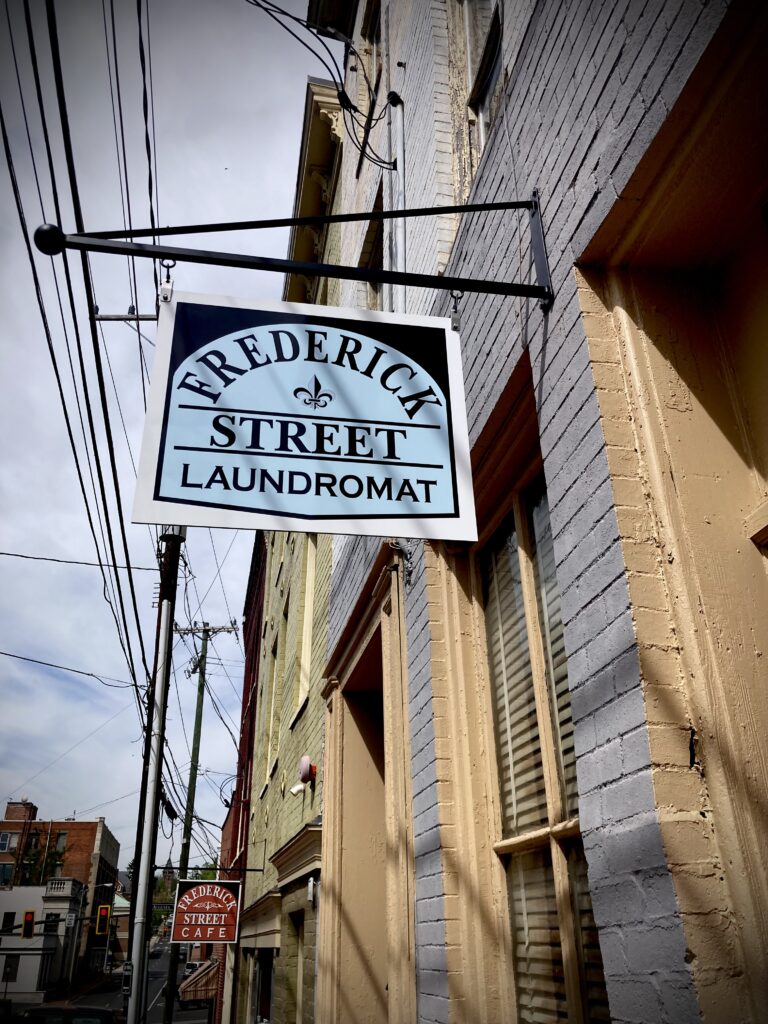 www.augustasigncompany.com-staunton-va-laundromat-sign-special sign brackets